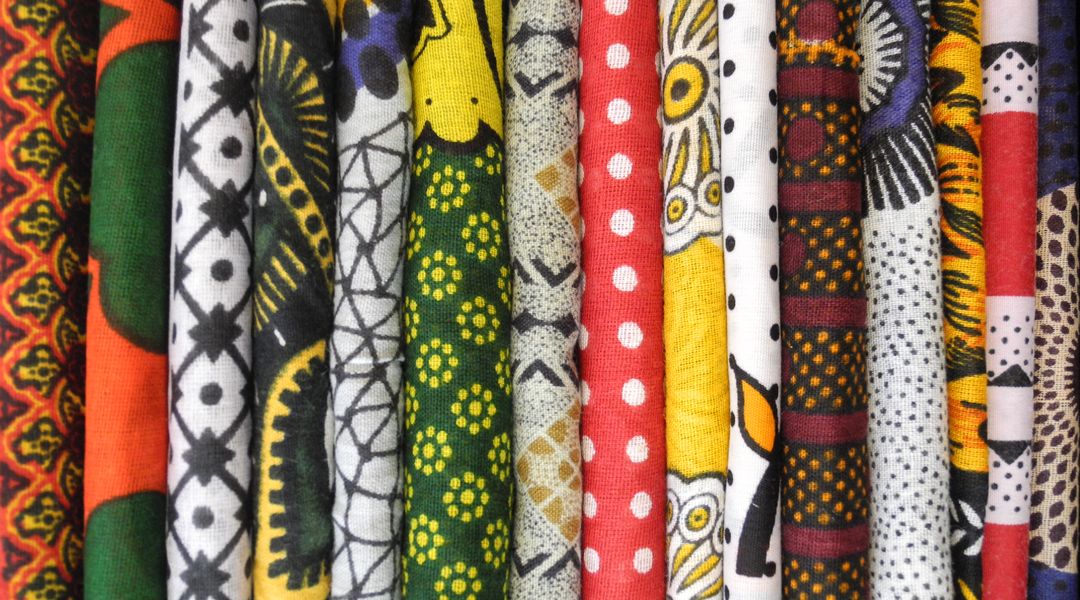 The picture shows folded East African cotton fabrics used mainly for women’s clothing, Foto: Berenike Eichhorn.